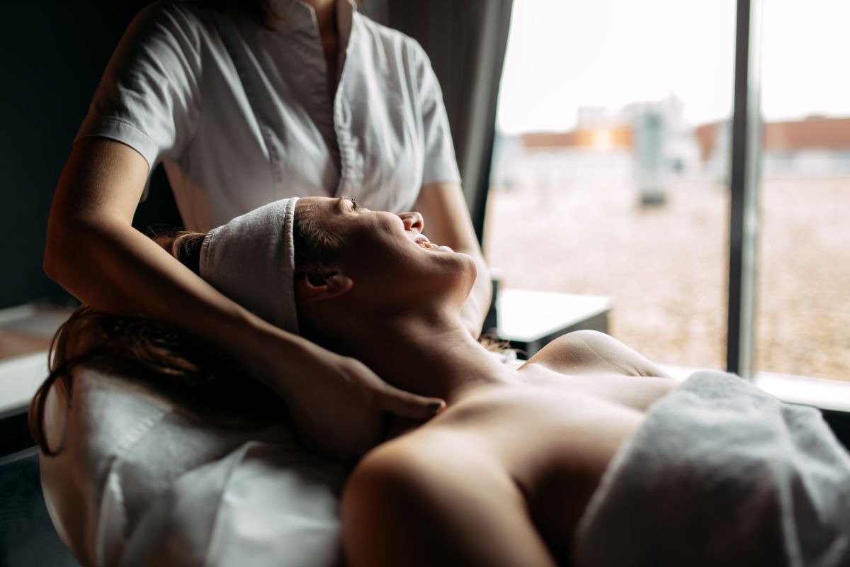 Pampering massaging of a beautiful brunette